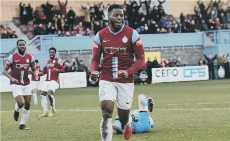  ?? ?? JJ Hooper celebrates after scoring his and South Shields’ fourth goal. Pictures: Kev Wilson