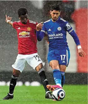  ?? — reuters ?? That’s mine: Manchester united’s amad diallo (left) vying for the ball with Leicester’s ayoze Perez during their English Premier League match at Old Trafford.