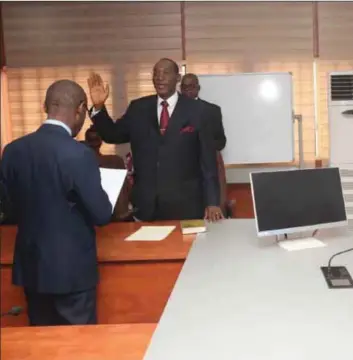  ??  ?? Hon. Justice Obisike Orji being sworn in as Acting Chief Judge by Abia State Governor Okezie Ikpeazu bearly three the Chief Judge, Hon. Justice Theresa Uzokwe was suspended