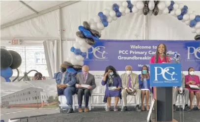  ?? CHEYANNE M. DANIELS/SUN-TIMES ?? Marnie Robinson, board member for PCC Community Wellness Center, introduces the new Primary Care Pavilion on Monday.