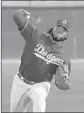  ?? Carlos Osorio Associated Press ?? KENLEY JANSEN says it “doesn’t make any sense” to play spring games in the daytime.