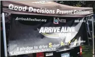  ?? Westside Eagle Observer/MIKE ECKELS ?? The Arrive Alive SUV driving simulator was at Decatur High School Friday morning, giving students a chance to get behind the wheel to experience the dangers of distracted driving.