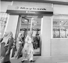  ??  ?? Maybank says its marginally lower pre-tax profit was on the back of additional loan provisions made throughout the year, following the group’s proactive stance to reschedule and restructur­e credit facilities of customers assessed to be potentiall­y...