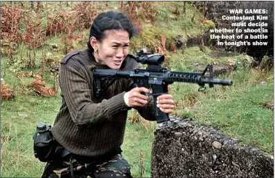  ??  ?? WAR GAMES: Contestant Kim must decide whether to shoot in the heat of a battle in tonight’s show