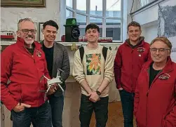  ?? ?? Ready to launch: Museum manager Niall McCaughan (left) with trainers from Big Wheel and museum staff who will pilot the newly-purchased drone. DRHM