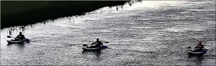  ?? ?? MERCY MISSION: Kayakers and specialist search teams have scoured more than 20 miles of the flood-hit River Don