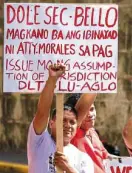  ?? —LYNRILLON ?? Some drivers of DLTB, allied with a labor group claiming to represent all DLTB workers, vent their ire on Labor Secretary Silvestre Bello III during a rally on Jan. 3.