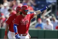  ?? CARLOS OSORIO — THE ASSOCIATED PRESS ?? The Phillies’ Bryce Harper waves to fans after his two-run home run against the Pirates on March 4in Clearwater, Fla.