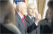  ?? Michael Reynolds European Pressphoto Agency ?? TOM PRICE, right, with Vice President Mike Pence, was confirmed to his new post by a 52-47 vote.