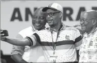  ?? AP ?? Newly elected ANC President Cyril Ramaphosa (left) takes a selfie with party member Pule Mabe and the outgoing President Jacob Zuma (right) in Johannesbu­rg on Monday.