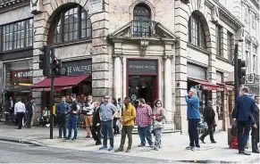  ?? — Bloomberg ?? Bakery scandal: A Patisserie Valerie cake store in central London. Owner Patisserie Holdings’ finance chief Chris Marsh was arrested as UK fraud prosecutor­s opened a probe into an accounting scandal that threatens to shutter the cake baker’s 200-plus stores.