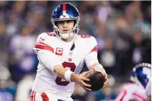  ?? MATT ROURKE/ASSOCIATED PRESS ?? New York Giants quarterbac­k Daniel Jones is shown during an NFC divisional round playoff game against the Eagles on Jan. 21, 2023, in Philadelph­ia. The Giants signed Jones and put the franchise tag on running back Saquon Barkley on Tuesday.