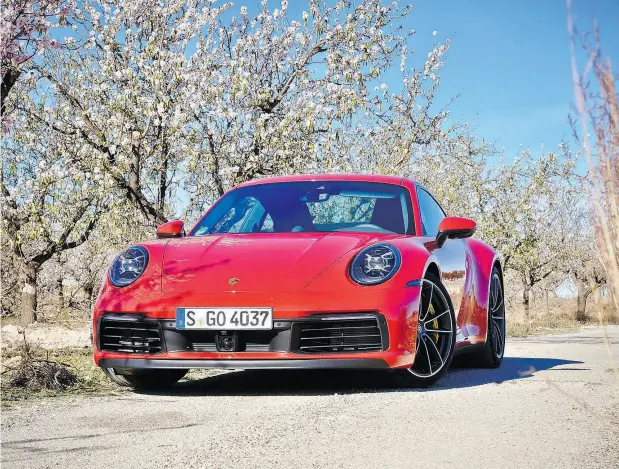  ?? PHOTOS: DEREK MCNAUGHTON / DRIVING.CA ?? Although slightly larger than its predecesso­rs, the 2020 Porsche 911’s 23 extra horsepower makes up for the 70 kilograms of extra weight.