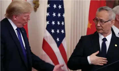  ??  ?? China’s vice vice premier Liu He signed the trade deal with Donald Trump. Chinese state media has downplayed success of the agreement. Photograph: Mark Wilson/Getty Images