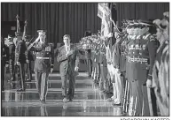  ?? AP/CAROLYN KASTER ?? Col. Jason Garkey (left), commander of the 3rd U.S. Infantry Regiment, escorts the 23rd secretary of the Army, Mark Esper, during a troop inspection at Joint Base Myer-Henderson Hall in Virginia. Esper was ceremonial­ly sworn in Friday, although he has...