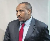  ?? PETER DEJONG • POOL VIA REUTERS ?? Congolese militia commander Bosco Ntaganda enters the courtroom of the Internatio­nal Criminal Court in The Hague, Netherland­s on Thursday.