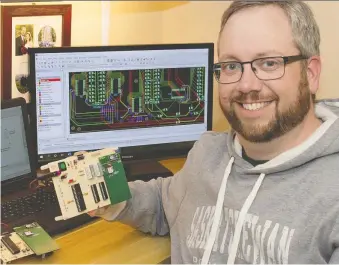  ?? ANDREW ASHTON ?? Andrew Ashton is a second-year student in Saskatchew­an Polytechni­c’s electronic systems engineerin­g technology program. He designed a Cribbage game that can be used by people with reduced vision.