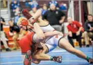  ?? NATE HECKENBERG­ER — FOR DIGITAL FIRST MEDIA ?? Boyertown’s Zak Reck works to score against Hunter Wright of Clearfield in a 7-4 decision at 160 pounds.