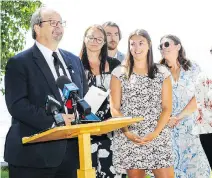  ?? JOHN MAHONEY ?? Longtime West Island MNA Geoff Kelley is joined by his family Monday as he announces he won’t be running in the upcoming election. His son Greg says he’s hoping to run for the Liberals.