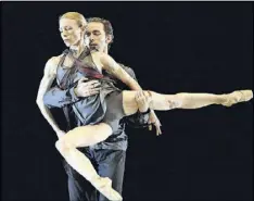  ?? HYOSUB SHIN / HSHIN@AJC.COM ?? John Welker is married to Christine Winkler, who danced for Atlanta Ballet for 19 years before retiring in 2014. At times, they performed together. Here, they’re in a dress rehearsal of Tara Lee’s “The Authors” several years ago.