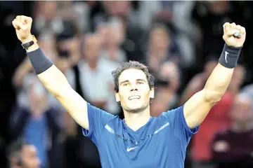  ?? — AFP photo ?? Spain’s Rafael Nadal celebrates winning against South Korea’s Hyeon Chung during their second round match at the ATP World Tour Masters 1000 indoor tennis tournament on November 1, 2017 in Paris.