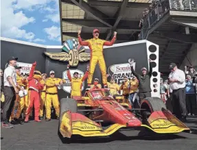  ?? MIKE DINOVO/USA TODAY SPORTS ?? Alex Palou celebrates Saturday after winning the Sonsio Grand Prix at the Indianapol­is Motor Speedway Road Course. The race was Palou’s first points-paying victory of 2024.