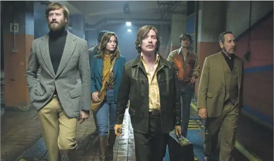  ?? A24 ?? ARMIE HAMMER, left, Brie Larson, Cillian Murphy, Sam Riley and Michael Smiley are part of the cast in the crime thriller “Free Fire,” set in Boston of the 1970s.