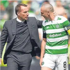  ??  ?? Celtic boss Brendan Rodgers and captain Scott Brown.