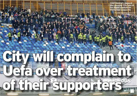  ?? PLUMB IMAGES/LEICESTER CITY/GETTY IMAGES ?? CONTINGENT: Some of the Leicester City fans in the Napoli stadium for the Europa League tie