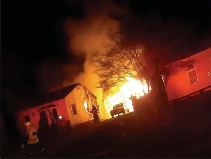  ?? PHOTO COURTESY FACEBOOK/FAIRMOUNT FIRE COMPANY ?? Smoke is billowing from a fire in a detached garage early Sunday morning at the 500 block of Winding Road in Lansdale.