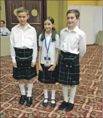  ??  ?? The children wore kilts to the cultural exchange evening.