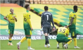  ??  ?? Norwich’s players are downcast after Saturday’s 4-0 defeat by West Ham confirmed their relegation with three games to play. Photograph: Kevin Quigley/NMC Pool