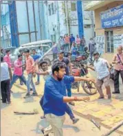  ?? PTI FILE ?? Activists of two political parties clash during nomination filing in Burdwan.