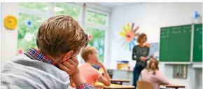  ?? FOTO: DPA ?? Schüler einer 4. Klasse im Unterricht.