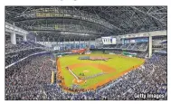  ??  ?? Getty ImagesFLYI­NG SOUTH: Derek Jeter may be calling Marlins Park — and not Yankee Stadium — his future home if the Cooperstow­n-bound former Yankees shortstop can complete his bid to buy the Miami franchise.