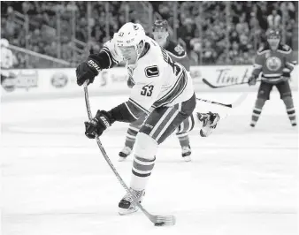  ??  ?? Bo Horvat takes a shot during the Canucks’ game in Edmonton last Saturday. The Oilers won 2-0.