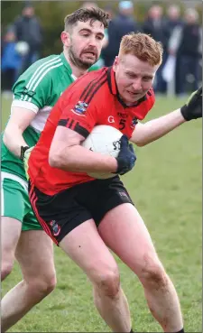  ??  ?? Mattock Ranger’s Ryan Lenehan tries to evade a challenge against St Patrick’s.