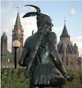  ??  ?? • Aboriginal photo-artist Jeff Thomas loves the Hamilton MacCarthy sculpture Anishinabe Scout in Major’s Hill Park: “A warrior standing his ground in front of Parliament Hill.” The piece used to be located at the feet of the Samuel de Champlain...