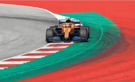  ?? AP ?? A first of many: Mclaren’s young Lando Norris exceeded expectatio­ns by clinching his first F1 podium finish.
