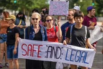  ?? PHOTO: TASOS KATOPODIS/GETTY IMAGES ?? Protesters march near the Supreme Court to demand an end to gun violence and call for abortion rights protection on May 28, 2022 in Washington, DC.