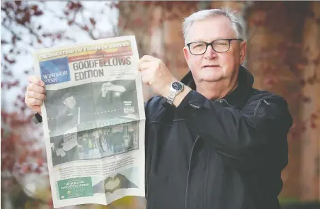  ?? DAN JANISSE ?? Windsor Goodfellow­s president Art Reid holds up a copy of the annual Goodfellow­s Edition on Thursday. He says demand for their Christmas hampers is going up while the fundraisin­g newspaper drive was a challenge this year because of COVID-19.