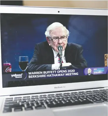  ?? ANDREW HARRER / BLOOMBERG FILES ?? Saturday’s Berkshire Hathaway meeting is likely to illustrate how Warren Buffett, above, and Charlie Munger have thrived together for so long, despite difference­s in politics — Buffett is a Democrat, Munger a Republican — and often investment ideas.