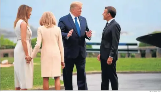  ?? NEIL HALL / EFE ?? Donald Trump y Emmanuel Macron, ayer en Biarritz junto a sus esposas.