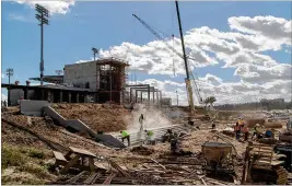  ?? ALLEN EYESTONE / THE PALM BEACH POST ?? Constructi­on of steps that would lead up the main entrance at the ballpark is seen late last year. Work at the site started in November 2015.