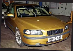  ??  ?? Escape: The gold Volvo getaway car was left abandoned