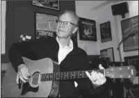  ?? The Associated Press ?? BOBBY VEE: In this Dec. 18, 2013, file photo, Bobby Vee plays guitar at his family’s Rockhouse Production­s in St. Joseph, Minn. Vee, whose rise toward stardom began as a 15-year-old fill-in for Buddy Holly after Holly was killed in a plane crash, died...