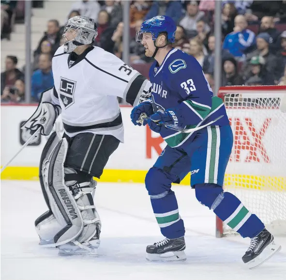  ?? GERRY KAHRMANN/PNG FILES ?? Vancouver Canucks Henrik Sedin and Los Angeles Kings goalie Jonathan Quick will be meeting on unfamiliar ice when both teams play two pre-season games in China — Thursday and Saturday in Shanghai and Beijing respective­ly.