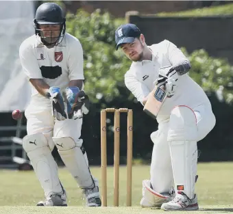  ??  ?? Murton batsman Ged Charlton hits out against the bowling of Jonny Errington in last week’s defeat at Ryhope.