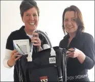  ?? ?? Elizabeth Carlotti receives her prize from Canterbury Golf Club clubhouse manager Michelle Perry