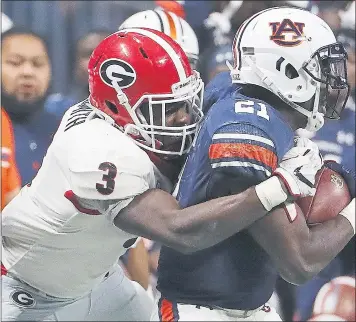  ?? DAVID GOLDMAN — THE ASSOCIATED PRESS ?? Georgia linebacker Roquan Smith (3) is a popular first-round draft choice for the Raiders in most national mock drafts.